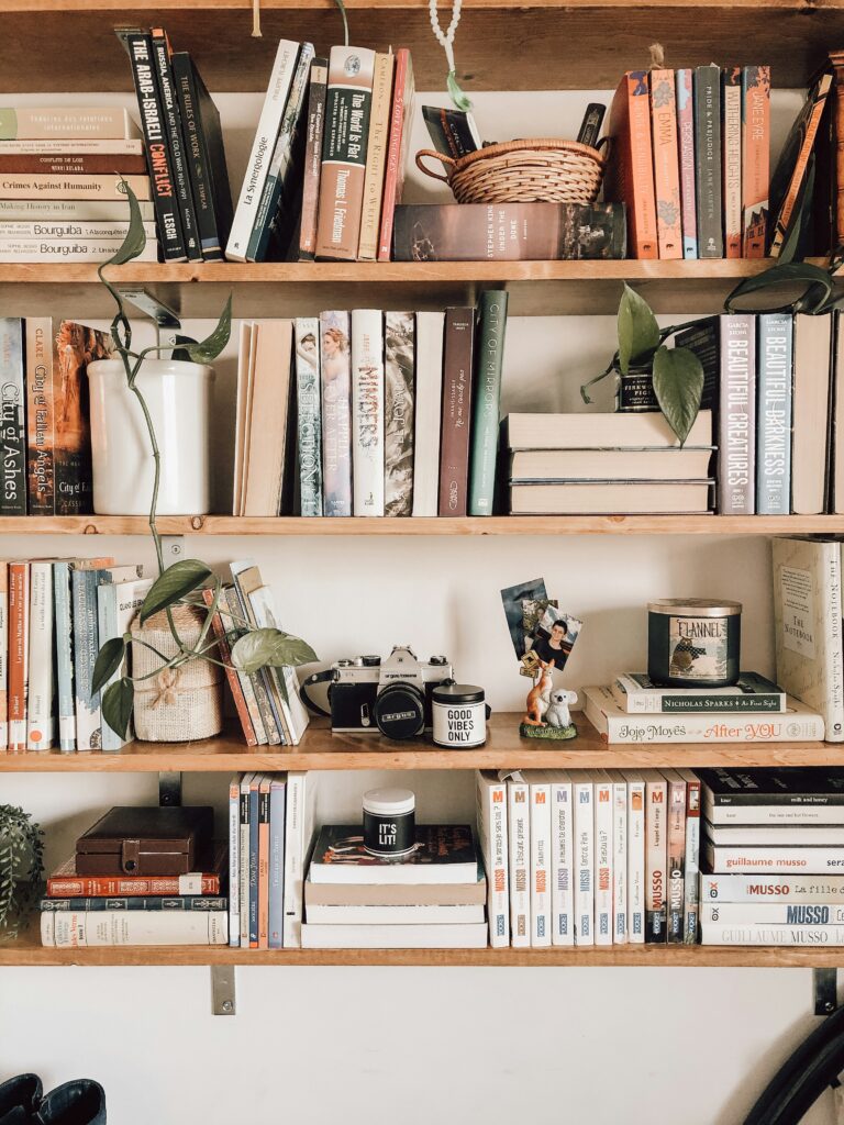 full book shelf in cozy reading nook