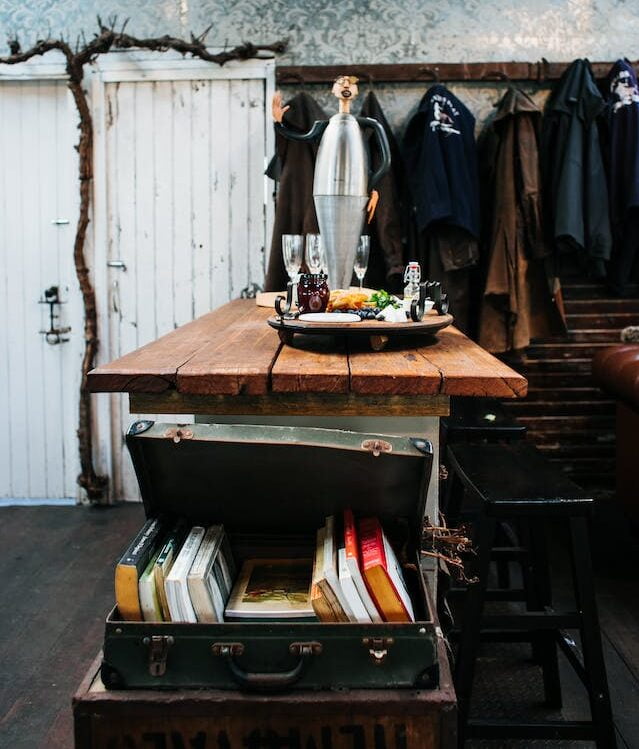 vintage suitcase bookcase style in rustic room 