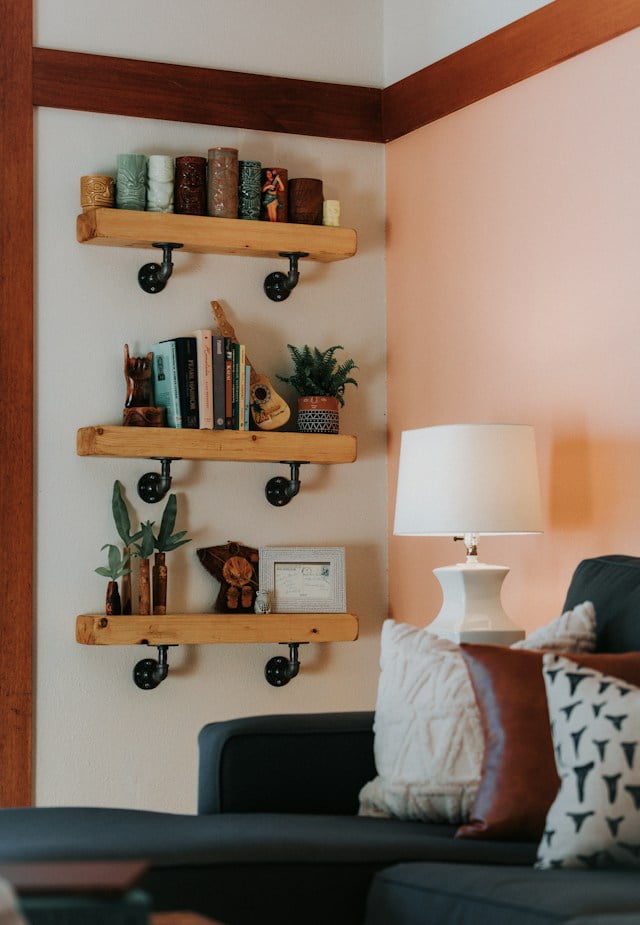 industrial pipe bookshelf styles on floating shelf