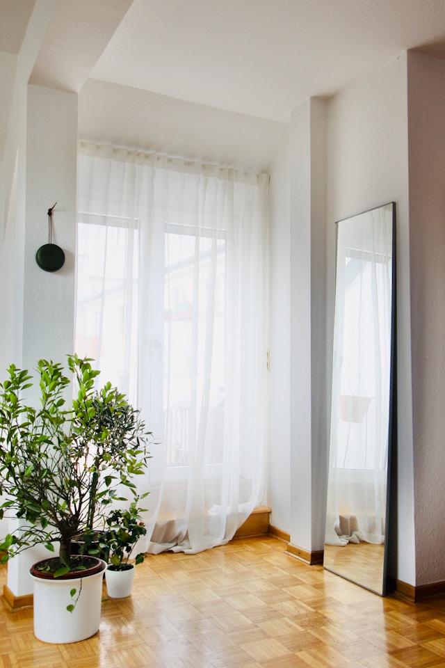 refresh your bedroom with sheer white curtains