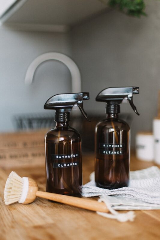 small brown bottles of cleaning supplies