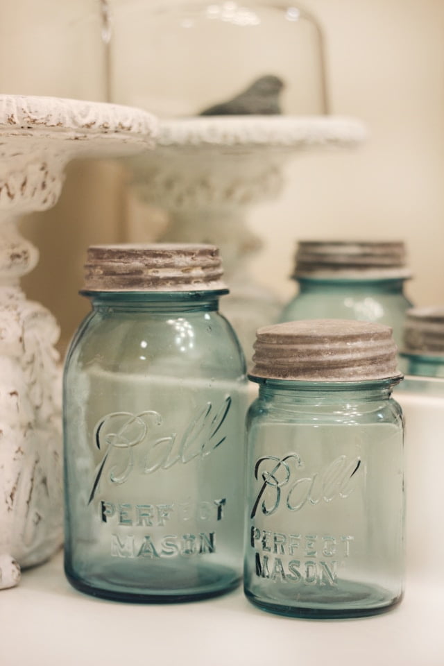 mason jars on counter as western bathroom decor ideas