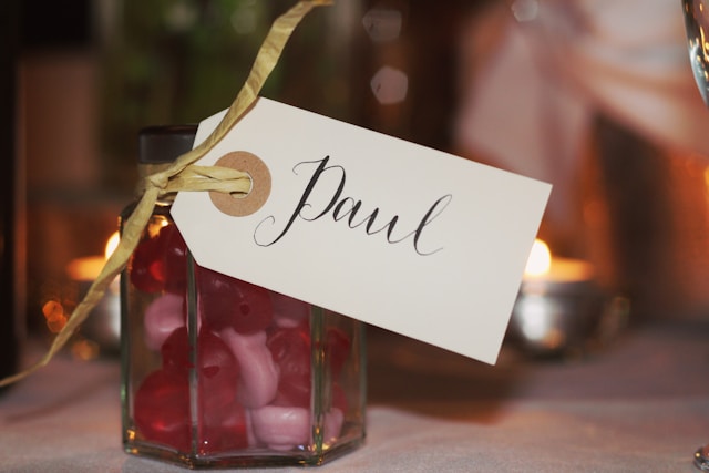 purple cocktail with personalized name tag