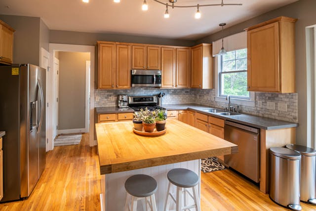 kitchen with all wooden cabinets