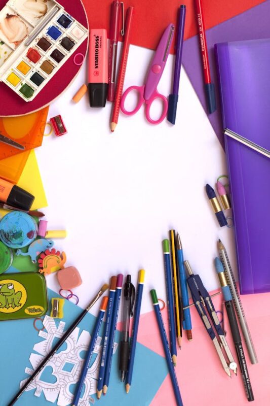 messy array of colorful school supplies