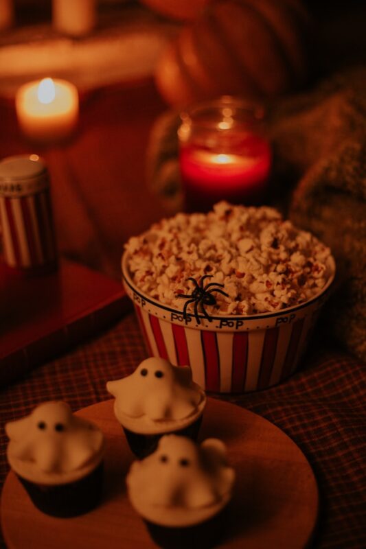 Halloween movie night popcorn and ghost cupcakes