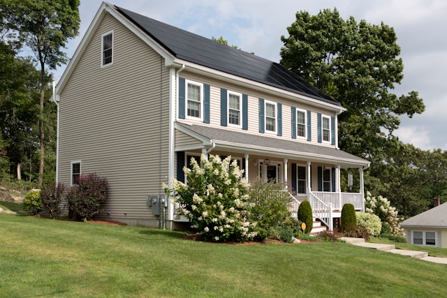 home with solar panels installed on roof